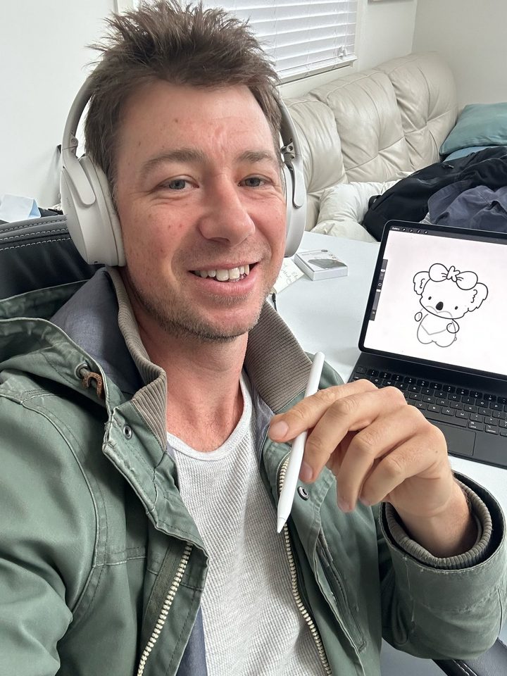Ebs, the artist behind Koko and Kobi, sketching Koko on an iPad